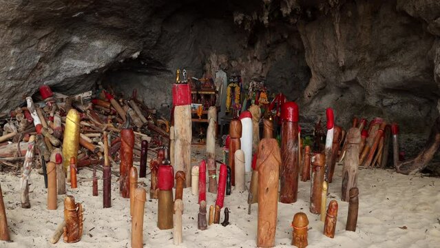 Wooden penis in Princess cave (Phra Nang Shrine Temple). South Railay beach in Krabi. Thailand.
