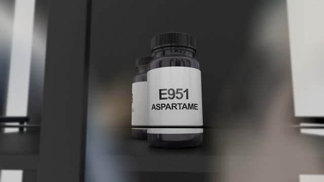 A little bottle of E951 aspartame, artificial non-saccharide sweetener food additive on a on a chemistry shelf.