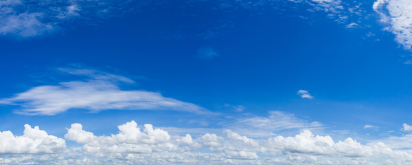 Naklejka na ściany i meble Beautiful blue sky background, white clouds covering thinly spread the sky
