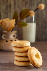 breakfast shortbread biscuits with glass of milk and  background