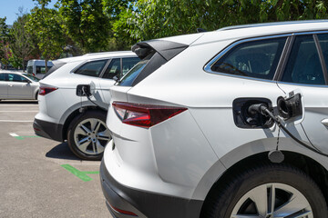 Fototapeta na wymiar cars being recharged in a parking lot in Koper, Slovenia