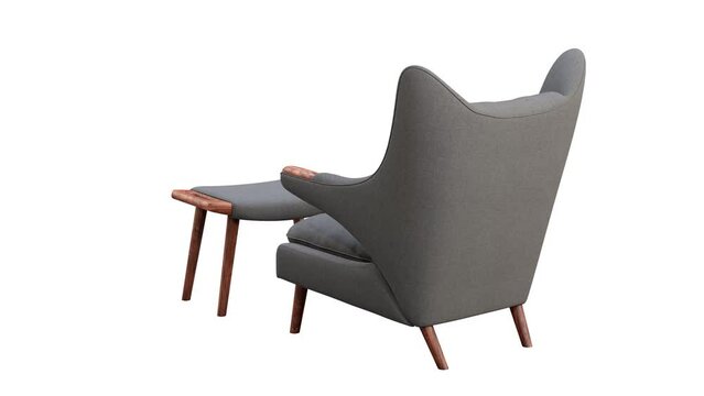 Circular animation of mid-century gray fabric wing chair and footrest. Fabric upholstery armchair with wooden legs on white background. Mid-century, Loft, Scandinavian interior. 3d render