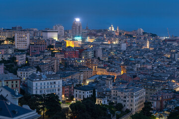 Fototapeta na wymiar a view of genoa city during the evening with open