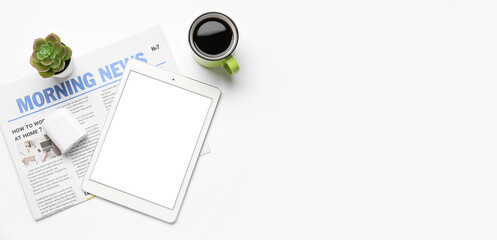 Tablet computer with blank screen, earphones, newspaper and cup of coffee on white background. Weather forecast concept
