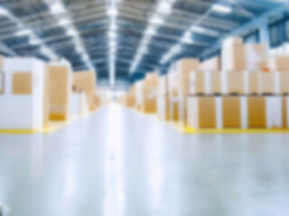 Blurred  A warehouse where the goods are packed in a large number of brown cardboard boxes.