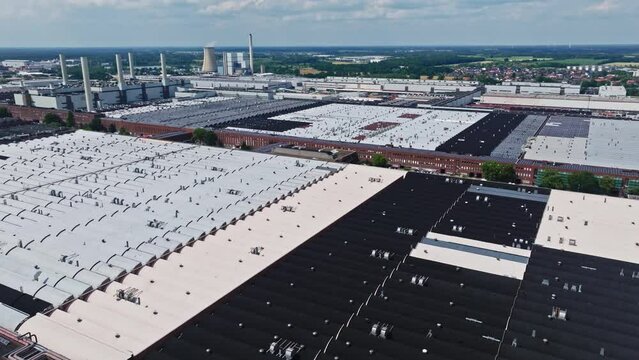 Drone shot of The Wolfsburg Volkswagen Factory , Wolfsburg , Germany  . The Wolfsburg Volkswagen Factory is the worldwide headquarters of the Volkswagen Group, and one of the largest manufacturing pla