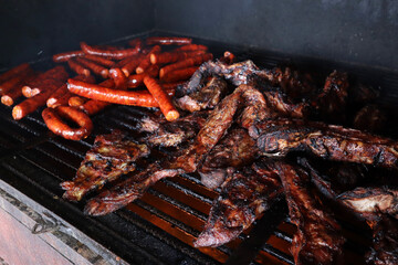 Several tasty slices of lean beef grilled whit sausage
