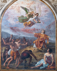 BIELLA, ITALY - JULY 15, 2022: The fresco of Stoning of St. Stephen in Cathedral (Duomo) by Giovannino Galliari (1784).