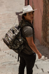 backpacker tourist walking in Guanajuato, Mexico
