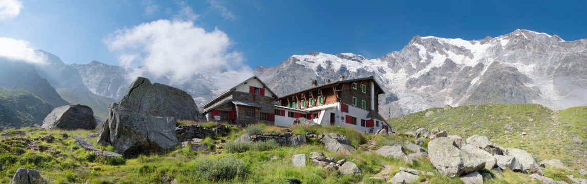 The  Punta Gnifetti peak (Monte Rosa massif) over the Rifugio Zambon Zappa chalet  - Valle Anzasca valley.