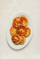 Chvishtari, corn flour tortillas with cheese, pastries, Georgian cuisine, Mchadi, homemade, top view, on a wooden table, no people,