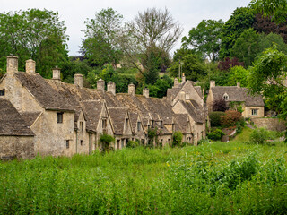 Ancient houses in the English village of Cotswolds, Bibury, England 