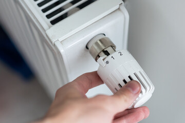 turning down thermostat on radiator to save energy due to heating cost price hike