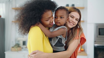 Lesbian couple moments happiness with american african adopted child. Mixed race lesbian couple. Lesbian marriage and adoption. Homosexual family, LGBTQ lifestyle