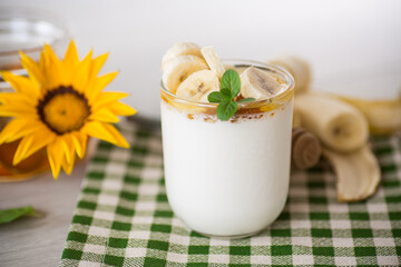 Sweet homemade yogurt with bananas and honey