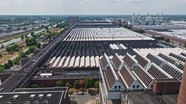 Drone shot of The Wolfsburg Volkswagen Factory , Wolfsburg , Germany  . The Wolfsburg Volkswagen Factory is the worldwide headquarters of the Volkswagen Group, and one of the largest manufacturing pla