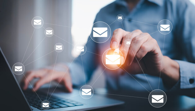 Business people working laptops with communication icons, letter icons, email icons, and newsletter email and protect your personal information or spam mail, Customer service call center contact.