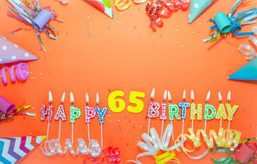 Top view birthday background with number  65. A beautiful holiday postcard on a colorful background...