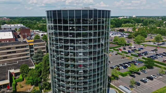 Drone shot of Autostadt museum , Wolfsburg , Germany . The Autostadt is a visitor attraction adjacent to the Volkswagen factory in Wolfsburg, Germany, with a prime focus on automobiles. 