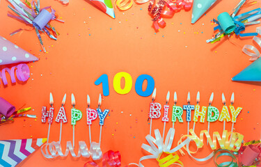 Top view birthday background with number  100. A beautiful holiday postcard on a colorful...