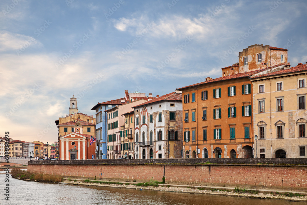 Wall mural pisa, tuscany, italy: landscape of the arno river bank lungarno with colorful ancient buildings and 