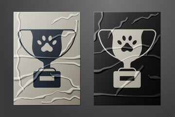 White Pet award symbol icon isolated on crumpled paper background. Medal with dog footprint as pets exhibition winner concept. Paper art style. Vector