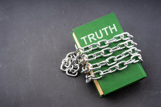 The Truth Is Written On The Book, It Is Bound By A Metal Chain