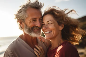 Fotobehang Happy smiling mature senior couple posing together  © Adriana