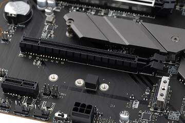 PC motherboard close-up. Close-up of a video card connector on a motherboard.