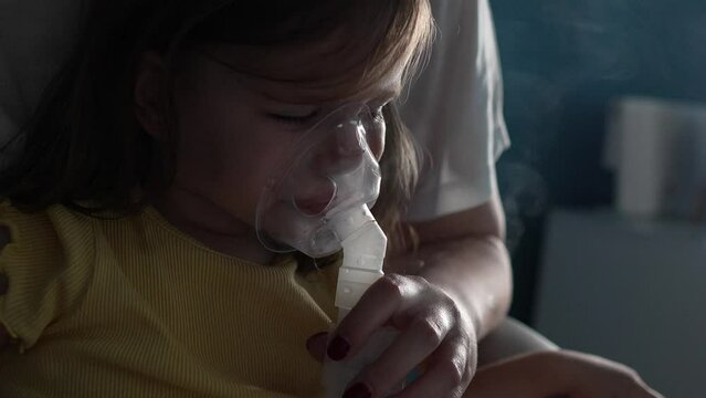 toddler use nebulizer at home girl vapor steam inhaler mask inhalation