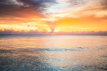 Fototapeta premium amazing sunset on the sea tropical beach