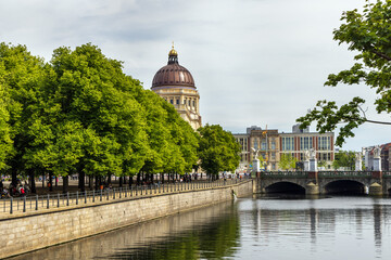 The Schloss Bridge over the Spree canal, with the dome of the rebuilt Berlin City Palace in the...