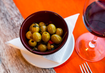 Pitted olives - typical Spanish snack closeup