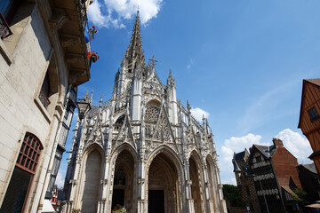 Fototapeta na wymiar The Church of Saint-Maclou is a Roman Catholic church in Rouen, France which is considered one of the best examples of the Flamboyant style of Gothic architecture.