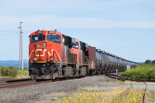 Stanwood, WA, USA - June 29, 2023; Canadian National ES44AC locomotive at head of oil train in Washington State USA