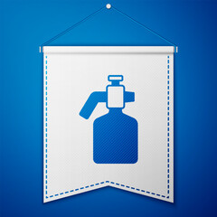 Blue Paint spray gun icon isolated on blue background. White pennant template. Vector
