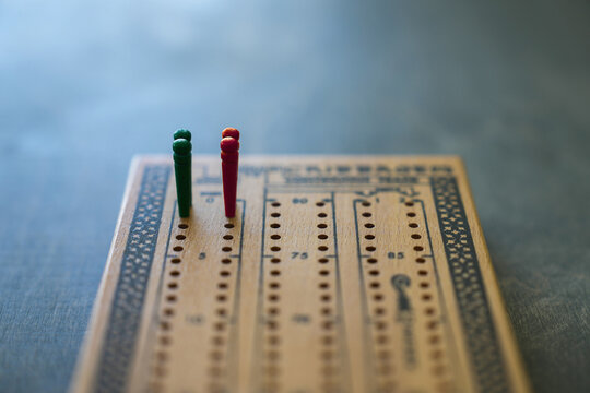 Close up of start pegs on cribbage board