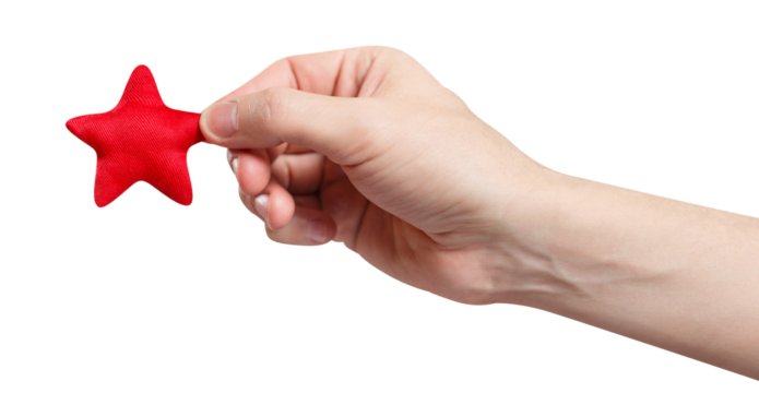 Male hand holding a red small star, cut out