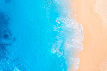 Coast as a background from top view.  Waves and beach. Aerial landscape. Azure water background from drone. Summer seascape from air. Vacation time. - obrazy, fototapety, plakaty