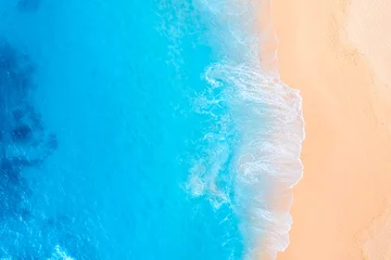 Fotobehang Coast as a background from top view.  Waves and beach. Aerial landscape. Azure water background from drone. Summer seascape from air. Vacation time. © biletskiyevgeniy.com