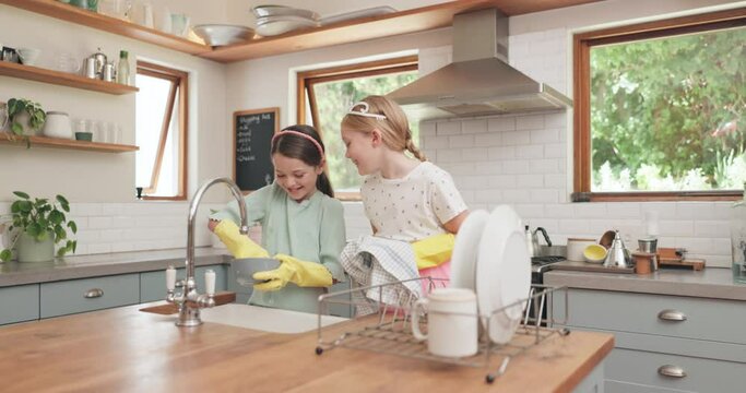 Learning, children and cleaning dishes in kitchen with sister, girl or helping to wash, dry and clean house with water. Kids, washing and cloth to wipe plates, cutlery or teaching housework to girls