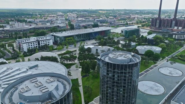 Drone shot of The Autostadt ( Automobile City) , a visitor attraction adjacent to the Volkswagen factory in Wolfsburg, Germany, with a prime focus on automobiles. Volkswagen car museum, driving tracks