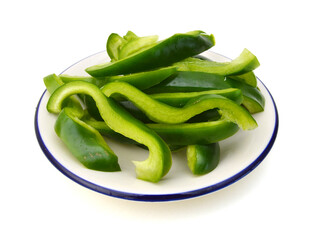 Sliced Green Peppers arranged on white background.