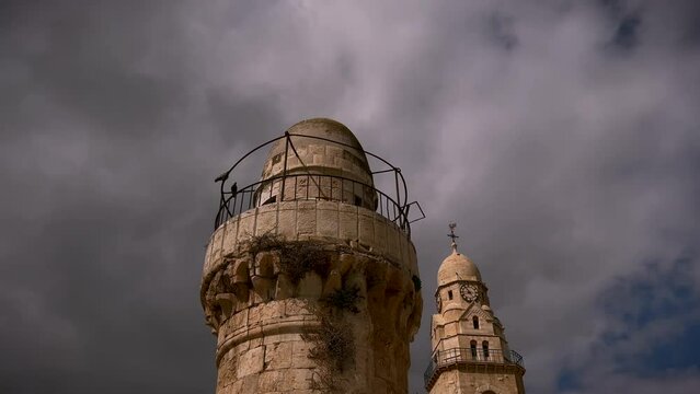 Representing religious diversity, a distorted, mirrored video of a church and a mosque combine in this view of the Old City in Jerusalem, Israel.