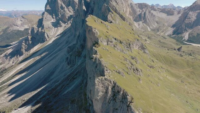 Seceda Aerial drone view flying above a peaceful alpine mountain top trekking area of the dolomite mountain range in val gardena italy 08