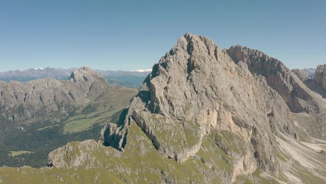 Seceda Aerial drone view flying above a peaceful alpine mountain top trekking area of the dolomite mountain range in val gardena italy 01
