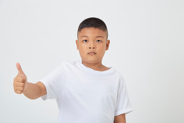 kids boy wearing a casual t-shirt standing isolated white background