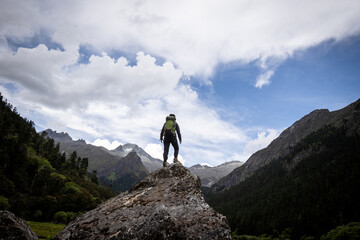 Hiking woman in high altitude mountains