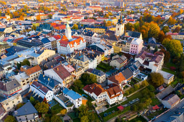 Aerial view of Sumperk cityscape overlooking Town hall and Saint John Baptist church on autumn day, Czech Republic