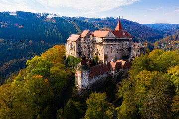 Medieval castle of Pernstein on a hill in the forest. South Moravian region. Czech Republic